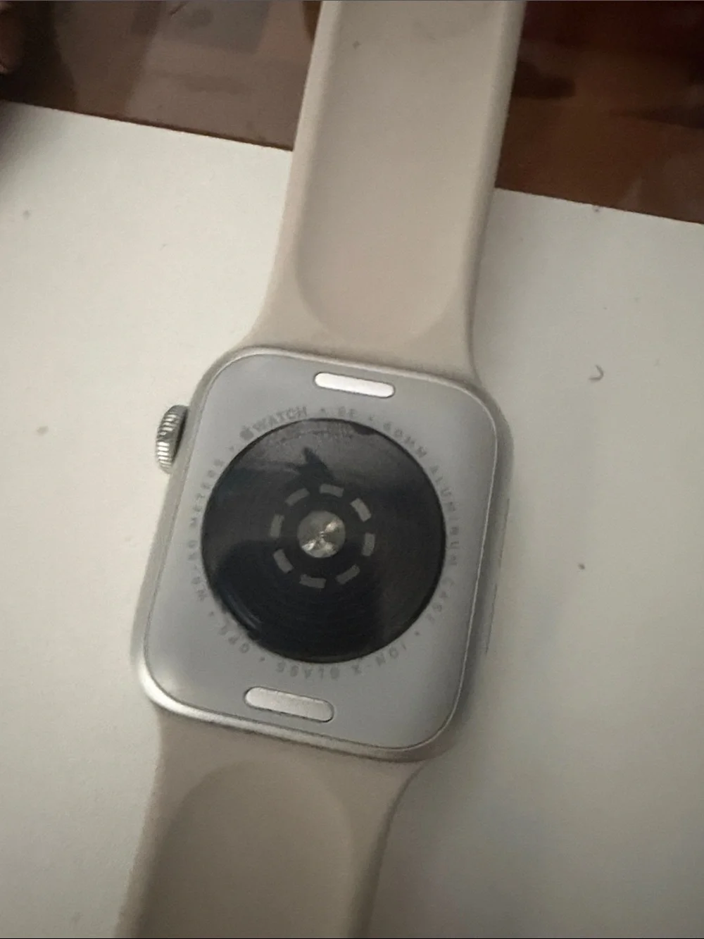 Apple Smartwatch with Beige Silicone Band and Silver Case